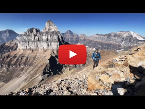 YouTube video of a couple climbing Mt. Temple wearing a helmet.